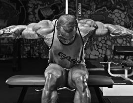 Как накачать плечи